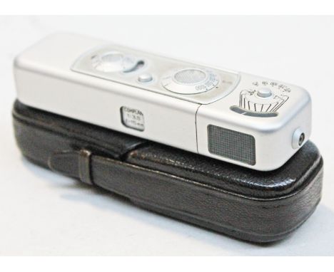 A Minox Wetzlar spy camera with leather case. Condition - good, general wear.