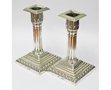 A pair of Victorian silver cluster column candlesticks, William Hutton & Sons, London, 1896. Condition - top of one has solde