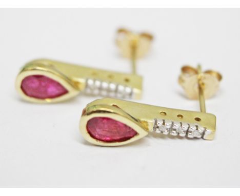 A pair of 9ct gold ruby diamond earrings, gross wt. 2.2g.