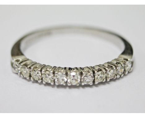 An 18ct gold diamond eternity ring, gross wt. 3.5g, size R.