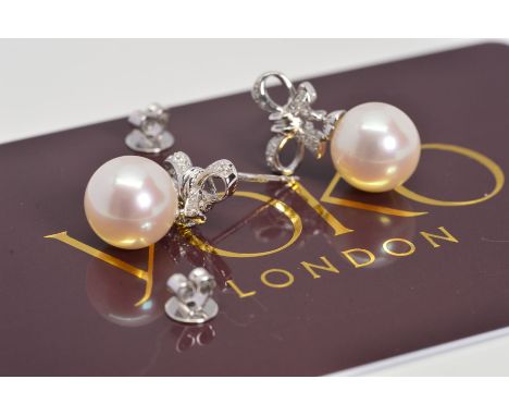 A MODERN PAIR OF YOKO 18CT WHITE GOLD CULTURED PEARL AND DIAMOND BOW DESIGN DROP EARRINGS, cultured pearls measuring approxim