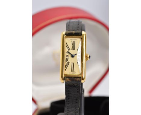 AN 18CT CARTIER WRISTWATCH, long rectangular case, Roman numeral ivory tone dial signed Cartier, signed Jaeger LeCoultre move