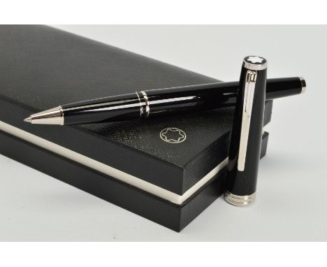 A MONT BLANC PIX BLACK ROLLER BALL PEN, the black resin cap and barrel with platinum coated details and clip, numbered MBPH4P