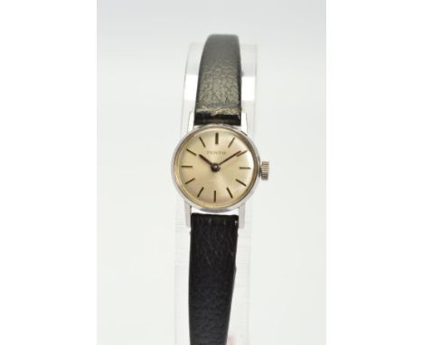 A ZENITH MECHANICAL LADIES COCKTAIL WRISTWATCH, silver baton dial, stainless steel case on a black leather strap (working con