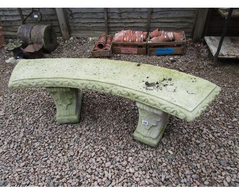 Curved stone garden bench