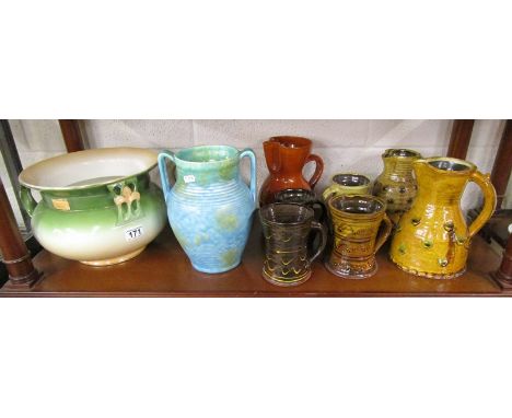 Shelf of studio pottery to include Trentham Art Ware