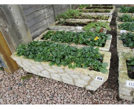 Pair of stone trough planters with feet