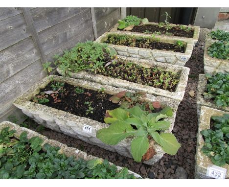 Pair of stone trough planters with feet