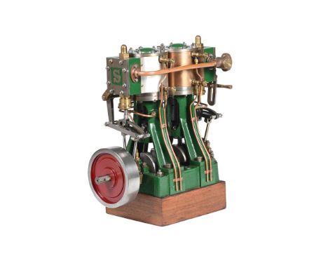 AN EXHIBITION STANDARD MODEL OF A STUART TURNER SWAN STEAMBOAT ENGINE Built to a high standard and having twin cylinders with