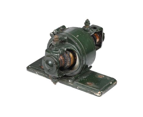 A DYNAMO EARLY 20TH CENTURY  Suitable for use with a small full-size engine or a period model and having wooden drive pulley 