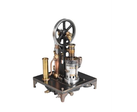 A VERTICAL RIDER ERICSSON HOT AIR ENGINE With central 7 inch diameter flywheel, open crank and flanked by cylinder and firebo