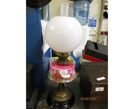 GOOD QUALITY VICTORIAN OIL LAMP WITH CRANBERRY AND POPPY DECORATED FONT ON A BLACK SLAG BASE AND OPAQUE SHADE