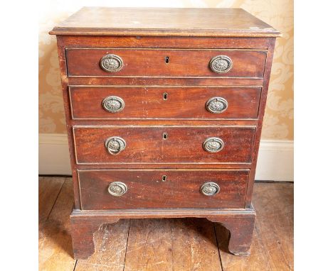A George III mahogany chest of drawers, circa 1780, fitted with four graduated drawers, fitted with later handles, raised on 
