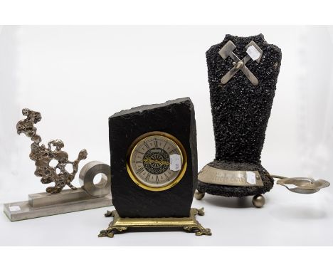 A German miners smokers companion made from coal minerals with the miners greeting Glück Auf on plaque to the front, along wi