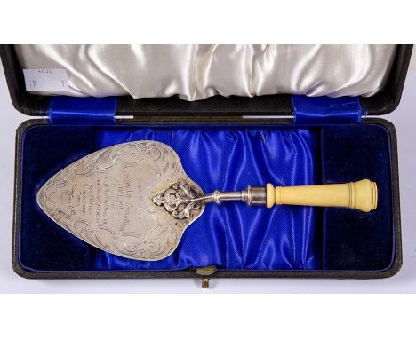 A George V silver presentation trowel, with turned ivory handle, engraved with floral border, possibly William James Dingley,