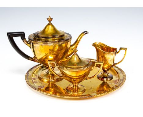 A 20th Century American sterling silver-gilt four piece tea set by Tiffany &amp; Co, plain&nbsp;Federal&nbsp;style comprising