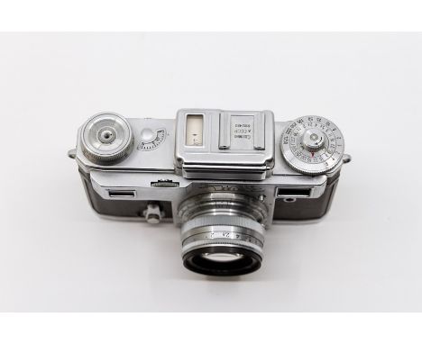 A Soviet Kiev 4A Rangefinder SLR camera, produced at the Arsenal factory, serial number 6102480, date 1961, name to front in 