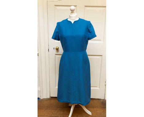 Ladies blue two piece dress and jacket by “Peter Barron” in light blue. Size 16.&nbsp;Harold &amp; Mary Wilson collection
