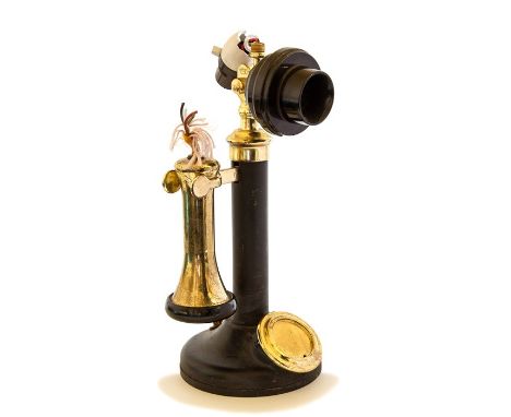 A candlestick telephone, model No 150, oven baked enamel shaft and base, bakelite transmitter and receiver end, brass main re