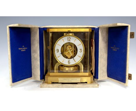 Jaeger-LeCoultre Atmos mantle clock, engraved plaque, 'Smiling Award 1970', the centre with exposed mechanism, white dial wit