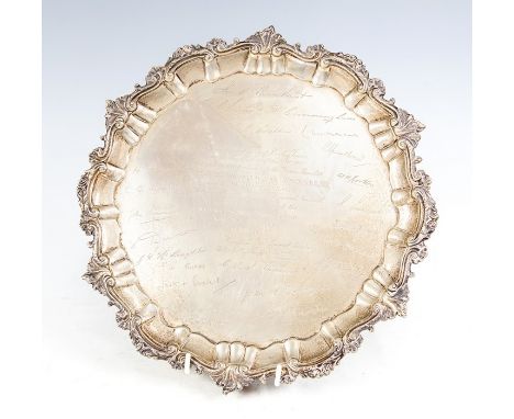 A Victorian silver salver, the border chase with rocaille and foliate border, on lappet feet, the centre with engraved presen