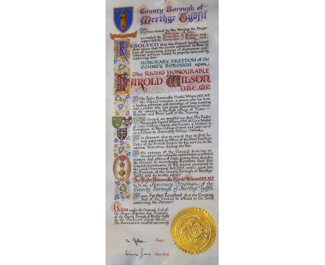 An impressive illuminated calligraphic parchment scroll presented to Harold Wilson on his admission as an Honorary Freeman of