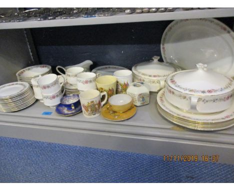 A Paragon dinner and tea set, along with commemorative mugs, Wedgwood Peter Rabbit money box and two cups and saucers 