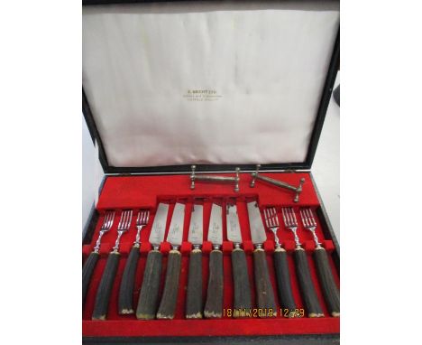 A vintage K Bright Ltd Horn handled style steak knives and forks, together with two silver plated knife stands 