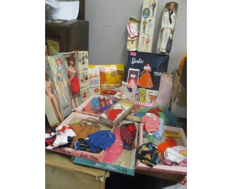 An early 1960s Mattel Barbie, Midge and Ken doll in original boxes A/F, together with a comprehensive selection of outfits to