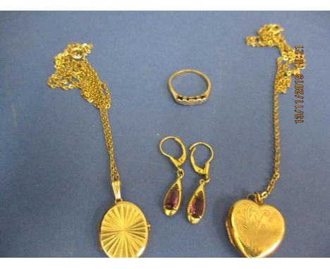 A pair of 14ct gold and amethyst drop earrings, a 9ct gold ring with three small diamonds, a 9ct gold heart locket with chain