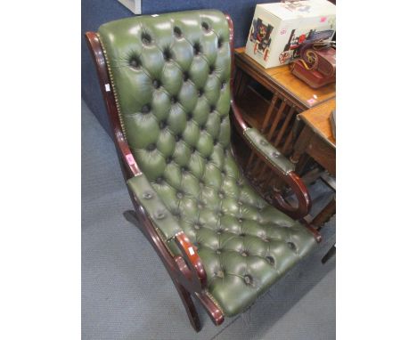 A reproduction green leather button back slipper chair 