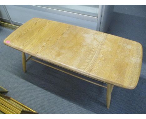 A light Ercol elm coffee table, 14 1/4"h x 41"w 