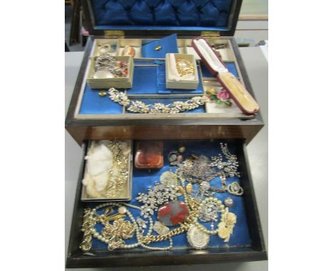 A mixed selection of costume jewellery to include diamante and marcasite brooches, necklace, bracelet etc, some held in a Vic