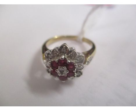 A 9ct yellow and white gold ruby and diamond ring, 3.25g 