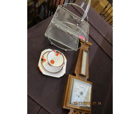 Art Deco related items to include a Shelley cup, saucer and plate, a chrome and glass cake stand and a mixed veneered baromet