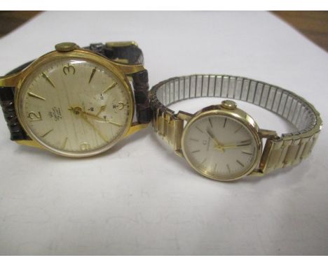 A 9ct gold Garrards ladies wristwatch with inscription to the rear, together with a vintage Smiths gents wristwatch 