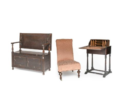 An 1920s Oak Monk Bench, 103cm wide, a Victorian nursing chair, an early 20th Century oak desk, and a barometer (4)