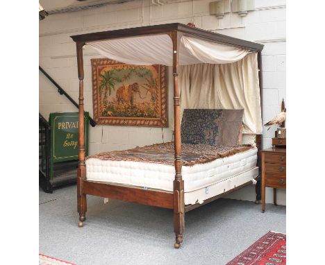 An Early 20th Century Mahogany Four Poster Bedstead, 135cm by 210cm by 216cmGood quality mattress fairly new, the frame assem