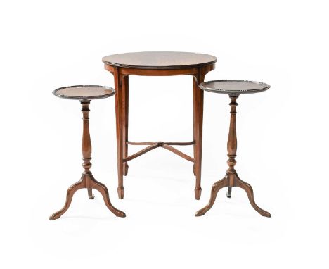 An Edwardian Inlaid Mahogany Plant table, on tapering square section supports joined by a stretcher, 60cm by 72cm, together w