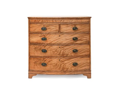 A George III Crossbanded Mahogany Bow Fronted Chest of Drawers, four height on bracket feet, 110cm by 52cm by 104cm
