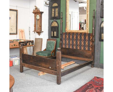 A Double Bedstead, composed of 18th century and later elements, 154cm by 220cm by 213cm