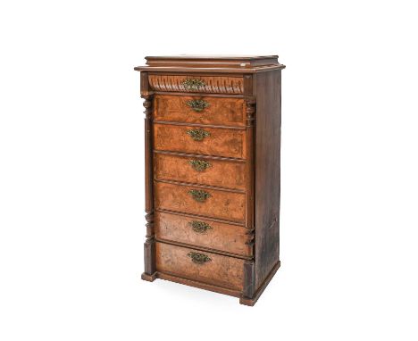A Crossbanded Walnut Secretaire Chest, with fluted columns and gilt brass pulls cast with putto, 74cm by 54cm by 136cmLacking