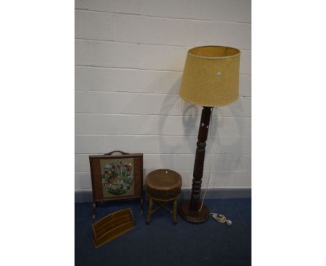 A VICTORIAN MAHOGANY FLUTED STANDARD LAMP, with a rattan shade, converted from a bed post (repair to centre, see image) toget
