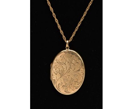 A 9CT OVAL LOCKET AND CHAIN, an oval locket with scroll engraving measuring approximately 40.0mm x 30.0mm, hallmarked 9ct gol