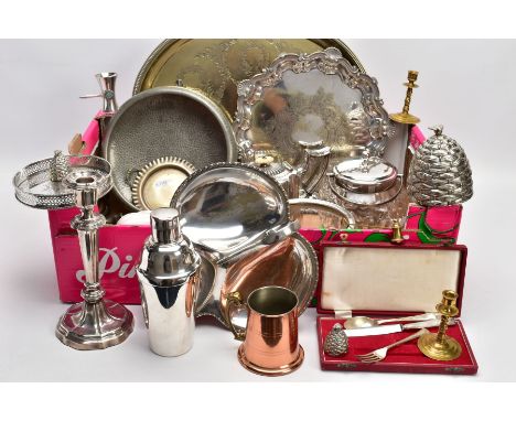 A MIXED BOX OF METALWARE, to include silver plated serving trays, cocktail shakers silver plated teapot, candle stick, a bras