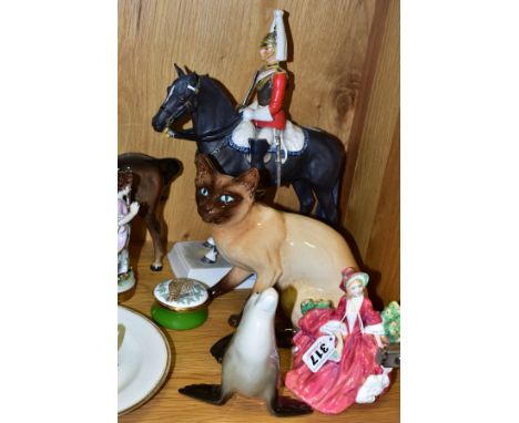 A GROUP OF ASSORTED CERAMICS, including a Royal Doulton Lydia HN1908, a Russian Sealion, a Sylvac seated cat, model no 5107, 