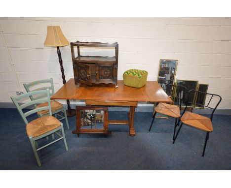 A PAIR OF MODERN METAL FRAMED CHAIRS, a pair of green painted rush seated chairs, an oak art deco draw leaf table, width 107c