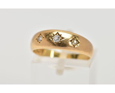 AN 18CT GOLD THREE STONE DIAMOND RING, designed with three, star set old cut diamonds, total estimated diamond weight 0.10cts