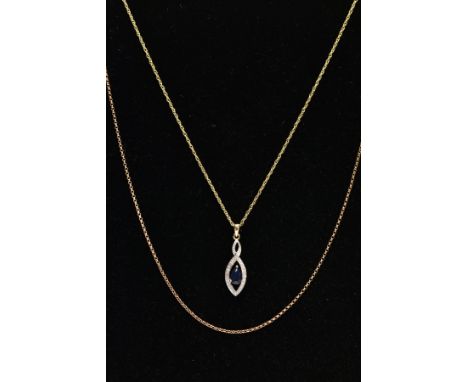 A YELLOW METAL SAPPHIRE AND DIAMOND PENDANT NECKLACE AND A YELLOW METAL BELCHER CHAIN, the pendant set with a marquise cut bl