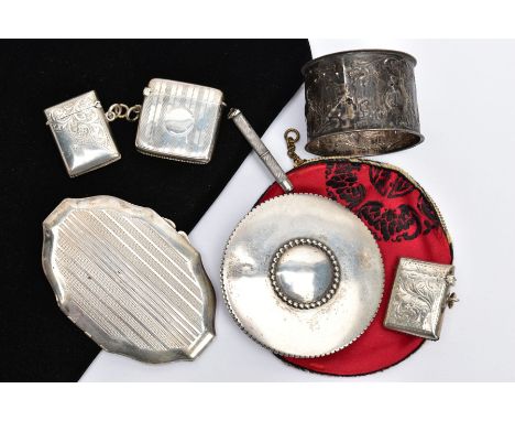 SEVEN SILVER AND WHITE METAL ACCESSORIES, to include three early 20th century silver vesta cases, a retractable silver toothp